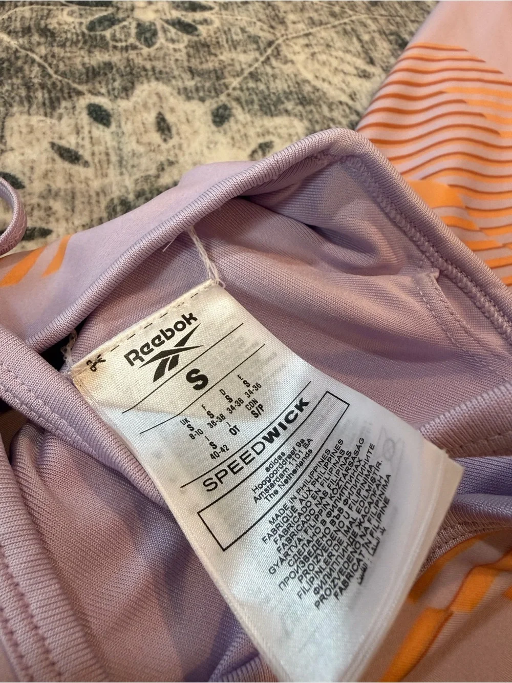 Reebok Lavender and Orange Graphic High-Rise Leggings with matching sports bra